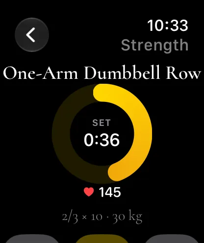 Apple Watch mid-set: One-Arm Dumbbell Row, a gold set ring at 0:36 and a heart rate of 145.